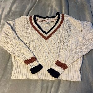 Cable knit sweater striped detailing